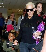 Amber Rose and son Sebastian Taylor Thomaz arriving at the Los Angeles International Airport.