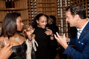 ATLANTA, GA - NOVEMBER 09: (R) Christophe demostates the wine tasting during the 'H.O.M.E. by Martell' event on November 9, 2017 in Atlanta, Georgia.