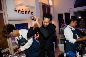 ATLANTA, GA - NOVEMBER 09: (R) Christophe demostates the wine tasting during the 'H.O.M.E. by Martell' event on November 9, 2017 in Atlanta, Georgia.