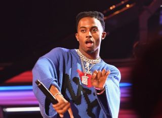 MIAMI BEACH, FL - OCTOBER 06: Rapper Playboi Carti performs onstage during the BET Hip Hop Awards 2017 at The Fillmore Miami Beach at the Jackie Gleason Theater on October 6, 2017 in Miami Beach, Florida.