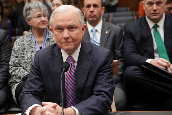 WASHINGTON, DC - NOVEMBER 14: U.S. Attorney General Jeff Sessions (2nd L) and his wife Mary (L) waits for the beginning of a hearing before the House Judiciary Committee November 14, 2017 on Capitol Hill in Washington, DC. Sessions is expected to face questions from lawmakers again on whether he had contacts with Russians during the presidential campaign last year.
