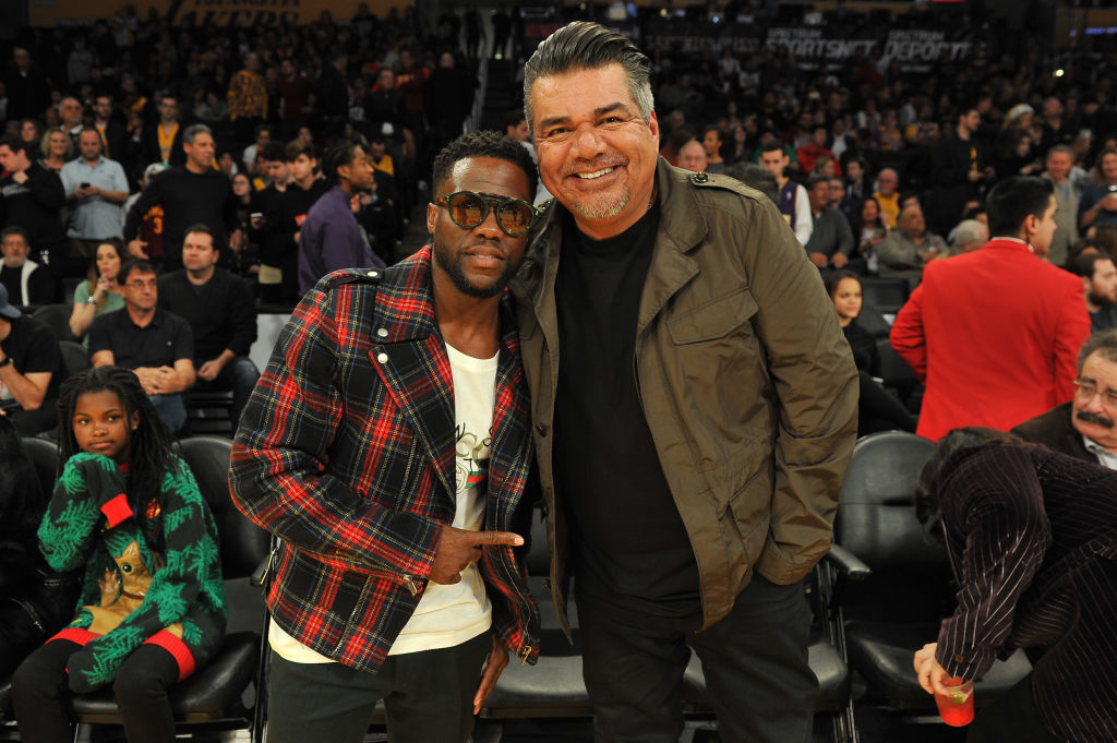 LOS ANGELES, CA - DECEMBER 25: Comedians Kevin Hart (L) and George Lopez attend a basketball game between the Los Angeles Lakers and the Minnesota Timberwolves at Staples Center on December 25, 2017 in Los Angeles, California.
