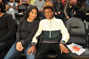 LOS ANGELES, CA - DECEMBER 25: Koraun Mayweather (R) attends a basketball game between the Los Angeles Lakers and the Minnesota Timberwolves at Staples Center on December 25, 2017 in Los Angeles, California.