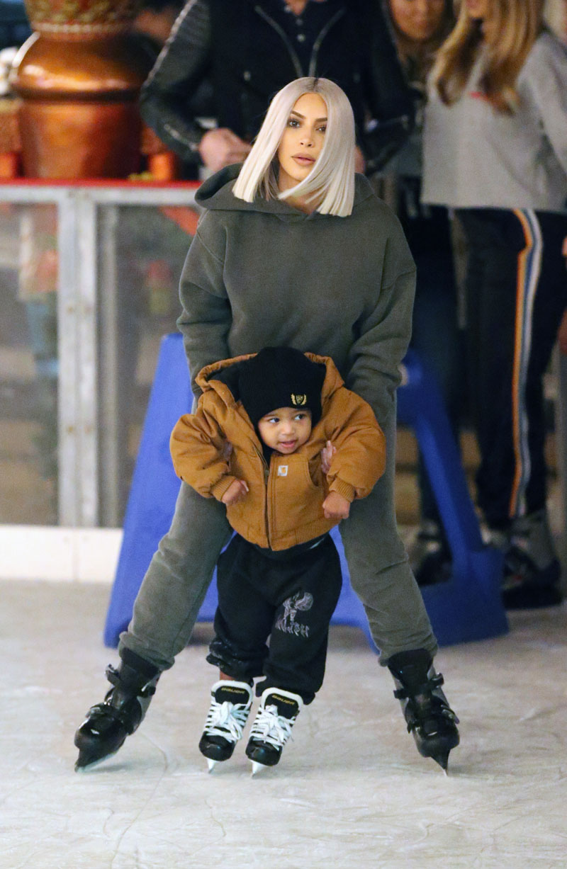 Kim Kardashian ice skating with North and son Saint at a Christmas party in Thousand Oaks,