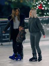 Kim Kardashian ice skating with North and son Saint at a Christmas party in Thousand Oaks,