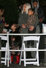 Kim Kardashian and daughter North arrive at the Ice skating rink with son Saint.