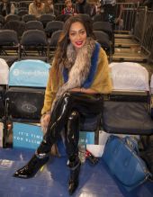 Lala Anthony sits court side at Madison Square Garden as her husband, Oklahoma City Thunder forward Carmelo Anthony #7 plays his former team, the NY Knicks.