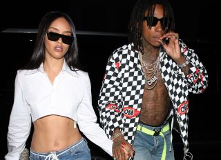 Rapper Wiz Khalifa and his girlfriend head to Catch restaurant for dinner in West Hollywood