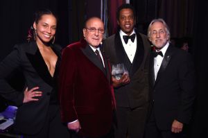 NEW YORK, NY - JANUARY 27: Recording artist Alicia Keys, host Clive Davis, Honoree Jay-Z, and Recording Academy and MusiCares President/CEO Neil Portnow attend the Clive Davis and Recording Academy Pre-GRAMMY Gala and GRAMMY Salute to Industry Icons Honoring Jay-Z on January 27, 2018 in New York City.