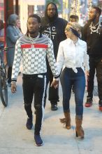 Cardi B and Off Set walk hand in hand as they shop together at Moncler on Rodeo Drive in Beverly Hills