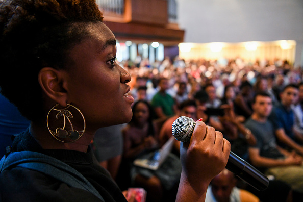WASHINGTON, DC - SEPTEMBER 27: Ofonime Idiong speaks during a forum about racist posters that were discovered on campus at the Kay Spiritual Life Center at American University on September 27, 2017 in Washington, DC.