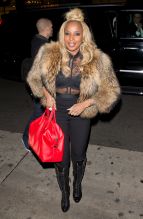 Mary J Blige was seen wearing a Fur Coast, Knee high boots and black top and pants as she arrived to celebrate her birthday with family at Mr. Chow the night before she gets her star on the Hollywood Walk of fame today