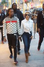 Cardi B and Off Set walk hand in hand as they shop together at Moncler on Rodeo Drive in Beverly Hills
