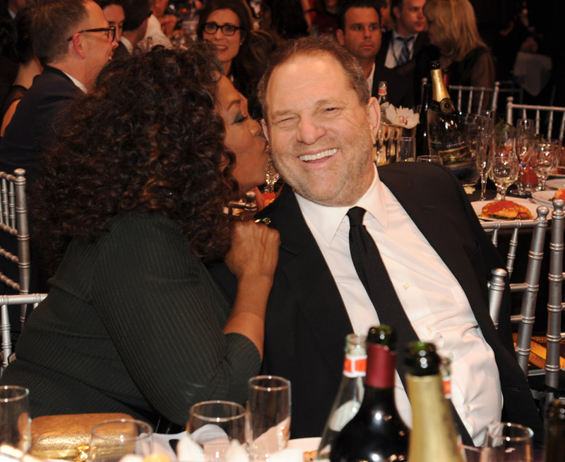 SANTA MONICA, CA - JANUARY 16: Oprah Winfrey and Harvey Weinstein attend the19th Annual Critics' Choice Movie Awards at Barker Hangar on January 16, 2014 in Santa Monica, California.