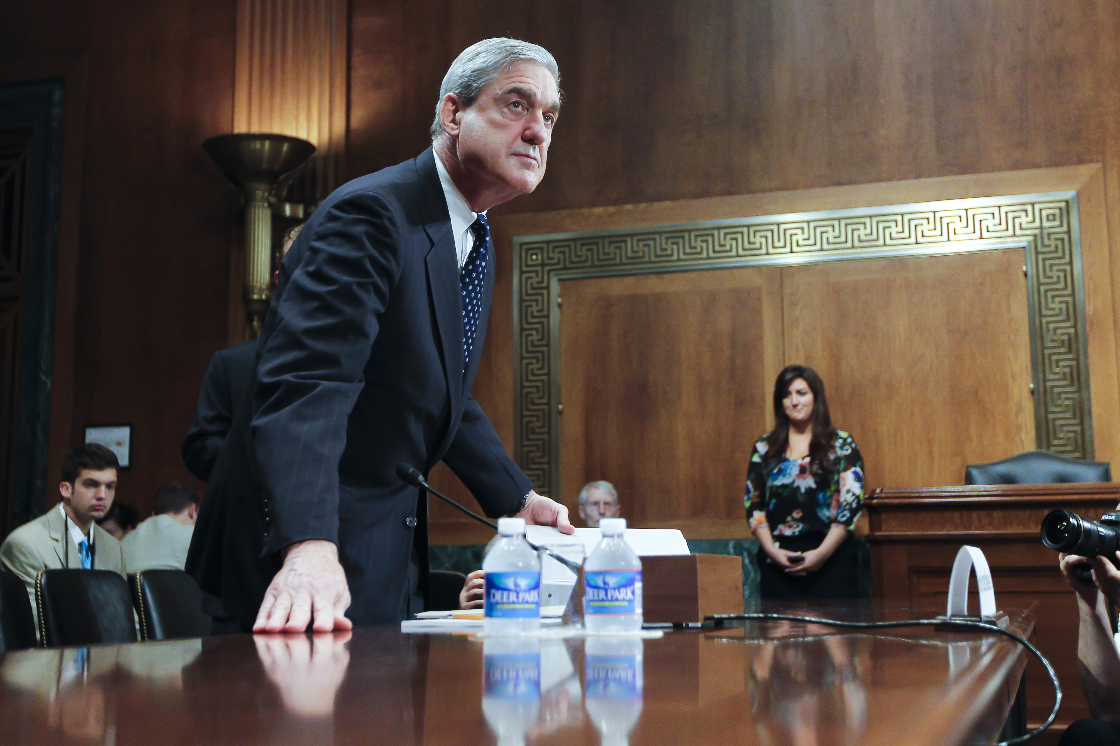 Russia Probe  Robert Mueller chats with senators prior to testifying before the Senate Judiciary Committee Hearing on oversight of the Federal Bureau of Investigation.