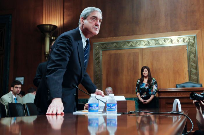 Russia Probe Robert Mueller chats with senators prior to testifying before the Senate Judiciary Committee Hearing on oversight of the Federal Bureau of Investigation.
