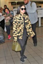 blac chyna arrives at lax airport†amid drama Kim Kardashian gifted her a gift