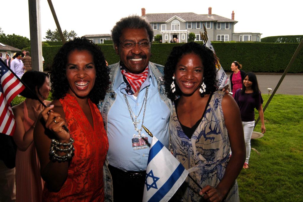 EAST HAMPTON, NY - JUNE 13: (L-R) Leslie Lewis Sword, Don King and Christina Lewis attend Reginald F. Lewis Foundation Gala Luncheon at Private Residence on June 13, 2009 in East Hampton, New York.