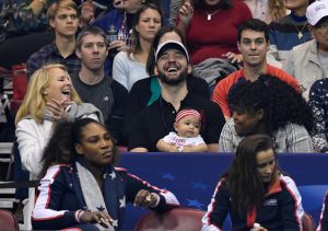 ASHEVILLE, NC - FEBRUARY 10: Serena Williams of Team USA, bottom left, along with her husband Alexis Ohanian and their daughter Alexis Olympia, center, watch the action during the first round of the 2018 Fed Cup at US Cellular Center on February 10, 2018 in Asheville, North Carolina.
