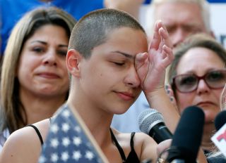 Marjory Stoneman Douglas High School student Emma Gonzalez speaks at a rally for gun control at the Broward County Federal Courthouse in Fort Lauderdale, Florida on February 17, 2018. Seventeen perished and more than a dozen were wounded in the hail of bullets at Marjory Stoneman Douglas High School in Parkland,Florida the latest mass shooting to devastate a small US community and renew calls for gun control.