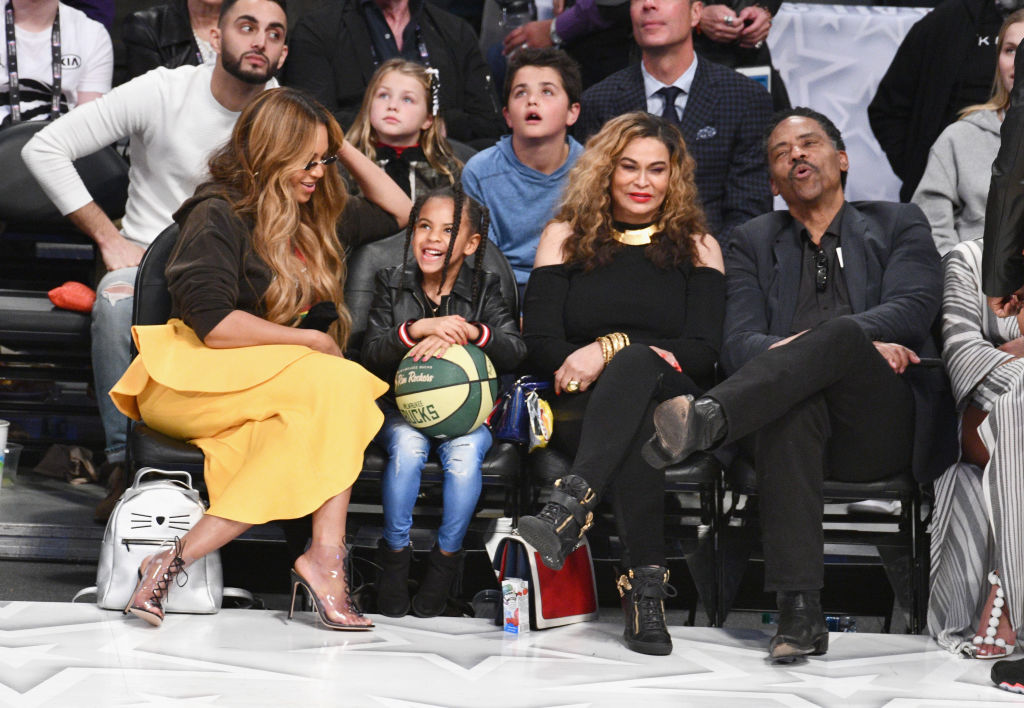 LOS ANGELES, CA - FEBRUARY 18: Beyonce, Blue Ivy Carter, Tina Knowles and Richard Lawson attend The 67th NBA All-Star Game: Team LeBron Vs. Team Stephen at Staples Center on February 18, 2018 in Los Angeles, California.
