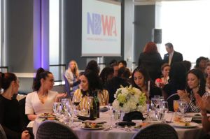Adrienne Bosh and Ayesha Curry converse at the NBWA Women’s Empowerment Summit Luncheon on Saturday, February 17, 2018