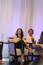 Ayesha Curry cracks a laugh during the panel at the NBWA Women’s Empowerment Summit Luncheon on Saturday, February 17, 2018