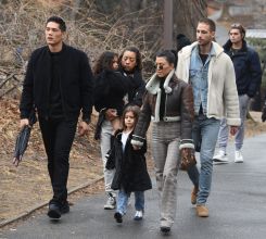 Kourtney Kardashian takes Penelope and North West to ice skating in Central Park, Little North West was seen taking a tumble on the ice several times and also scuffed her knee climbing rocks in Central Park