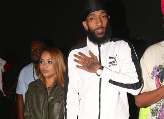 Rapper Nipsey Hussle and Lauren London. Arrive at the nice guy to celebrate nipsey new album.