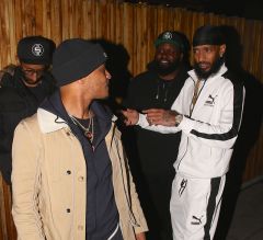 Rapper T.i arrives to nice guy. To celebrate with nipsey hussle. for his new album release party.
