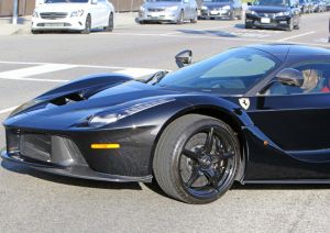 Kylie Jenner and Travis Scott dine with friends at Nobi in Malibu, CA. The new parents left the hotspot with a gang of security in toe as they made their way to their black LaFerrari super car. Recently a LaFerrari was auctioned off for 7.5 million dollars.