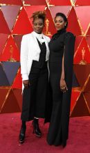Director Dee Rees (L) and Sarah Broom arrive for the 90th Annual Academy Awards on March 4, 2018, in Hollywood, California. / AFP PHOTO / ANGELA WEISS