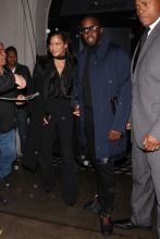 P. Diddy and Cassie walk hand in hand as they leave Craig's Restaurant