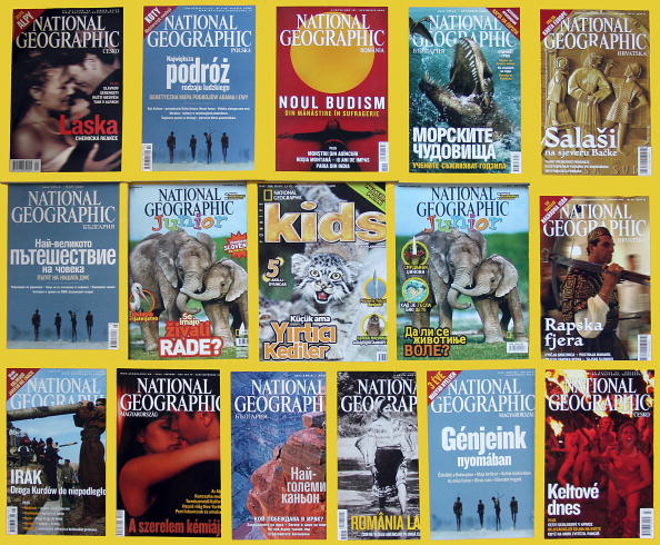This 04 April, 2006 photo illustration shows copies of National Geographic magazine in several languages. In 1995, National Geographic began publishing in Japanese, its first local language edition.
