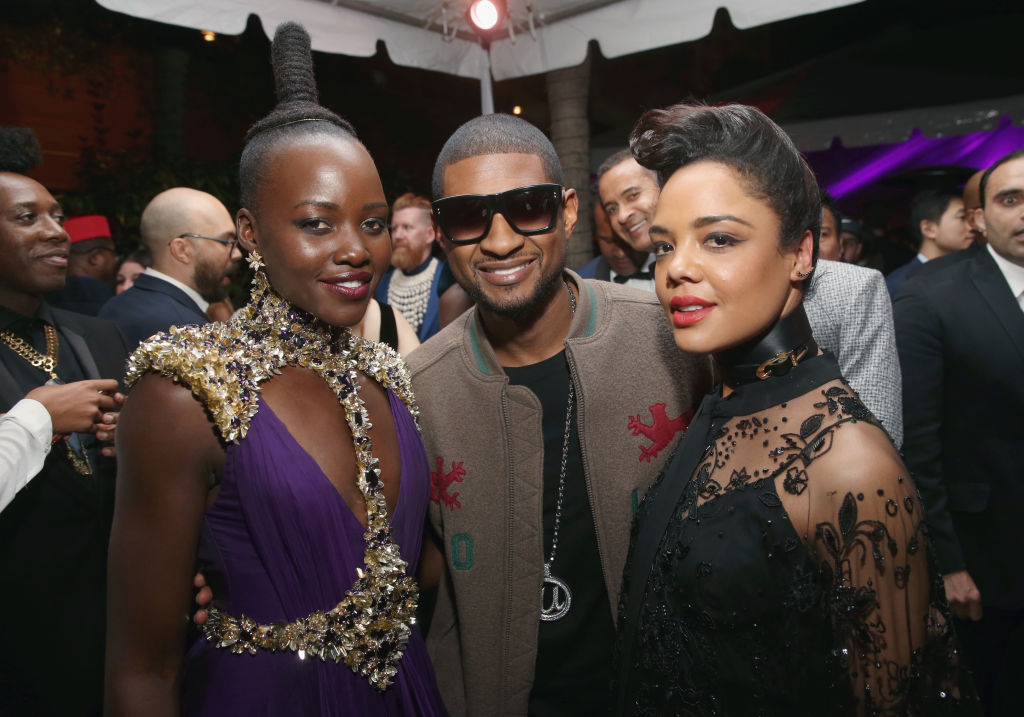 HOLLYWOOD, CA - JANUARY 29: (L-R) Actors Lupita Nyong'o, singer Usher and actor Tessa Thompson at the Los Angeles World Premiere of Marvel Studios' BLACK PANTHER at Dolby Theatre on January 29, 2018 in Hollywood, California.