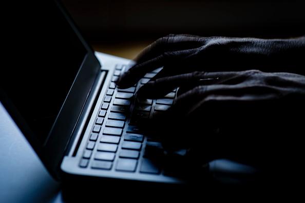 BERLIN, GERMANY - FEBRUARY 05: Hands typing on a computer keyboard on February 06, 2018 in Berlin, Germany.