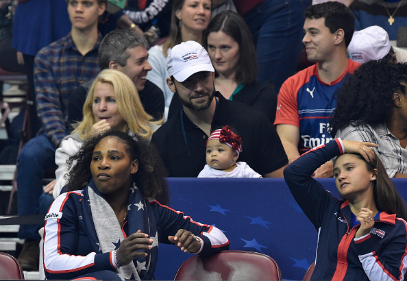 ASHEVILLE, NC - FEBRUARY 10: Serena Williams of Team USA, bottom left, along with her husband Alexis Ohanian and their daughter Alexis Olympia, center, watch the action during the first round of the 2018 Fed Cup at US Cellular Center on February 10, 2018 in Asheville, North Carolina. 