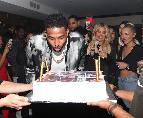 LOS ANGELES, CA - MARCH 10: Tristan Thompson blows out his birthday candles as Khloe Kardashian and friends look on at Remy Martin Presents Tristan Thompson's Birthday at Beauty & Essex on March 10, 2018 in Los Angeles, California.