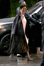 Kris Jenner waves as she leaves Khloe Kardashian's baby shower at the Hotel Bel Air.
