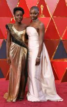 Kenyan actress Lupita Nyong'o (L) and US actress Danai Gurira arrive for the 90th Annual Academy Awards on March 4, 2018, in Hollywood, California. /