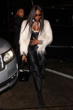 British model Naomi Campbell is all dressed as she heads to Craig's