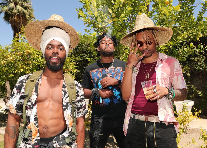 PALM SPRINGS, CA - APRIL 14:  (L-R) Venus, Rob Mac Film, and Doc of 'EarthGang' attend Interscope Coachella House 2018 on April 14, 2018 in Palm Springs, California.