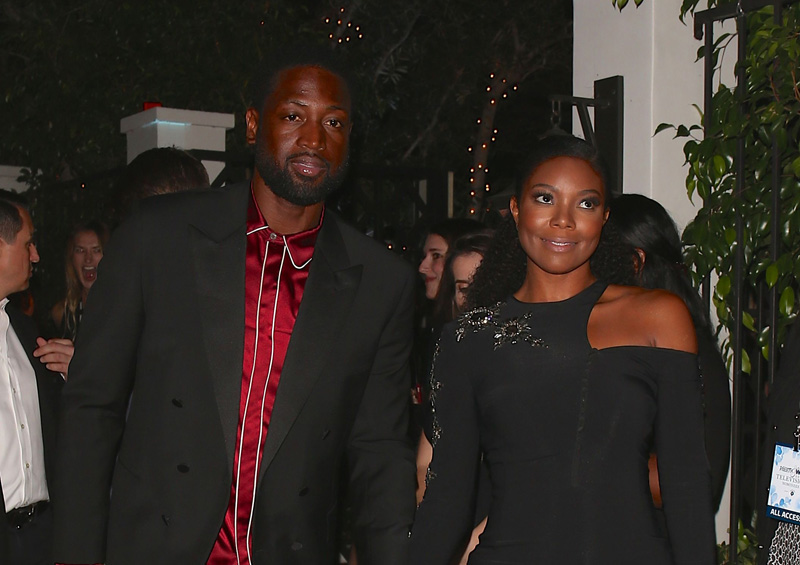 Dwyane Wade & wife Gabrielle Union exit Pre Emmy event hand and hand.