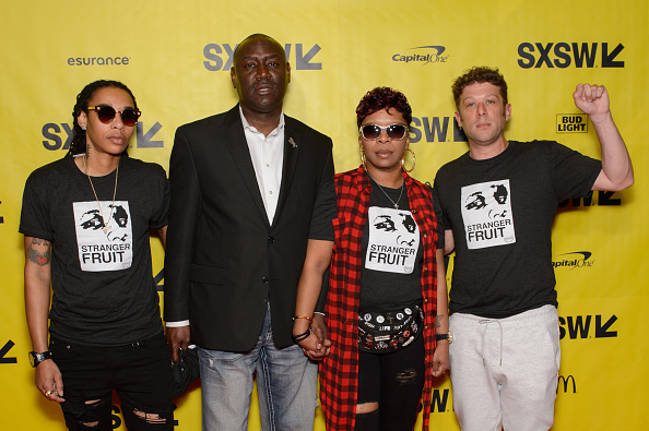 AUSTIN, TX - MARCH 11: KeyAnna Ewing, Mike Brown's attorney Benjamin Crump, Mike Brown's mother Lezley McSpadden and director Jason Pollock walk the red carpet at the SxSW Film Festival premier of Stranger Fruit at the Austin Convention Center on March 11, 2017 in Austin, Texas.