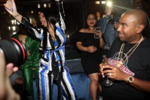 NEW YORK, NY - APRIL 10: Cardi B (L) and N.O.R.E. (r) attend the CARDI B "Gold Album" Release Party at Moxy Hotel on April 10, 2018 in New York City.