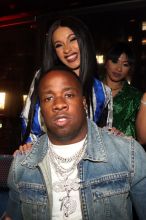 NEW YORK, NY - APRIL 10: Yo Gotti and Cardi B (rear) attend the CARDI B "Gold Album" Release Party at Moxy Hotel on April 10, 2018 in New York City.