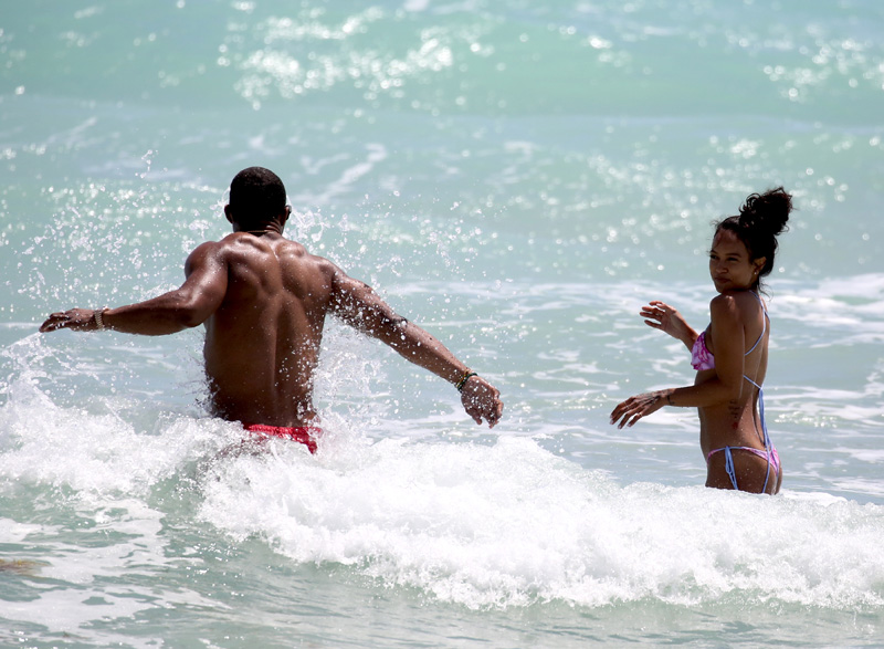 Karrueche Tran and her boyfriend NFL free agent Victor Cruz are seen during a beach day in Miami. Karrueche Tran was seen wearing a small golden necklace with her name written on it. The 29 year old actress has been filming her TNT show Claws.
