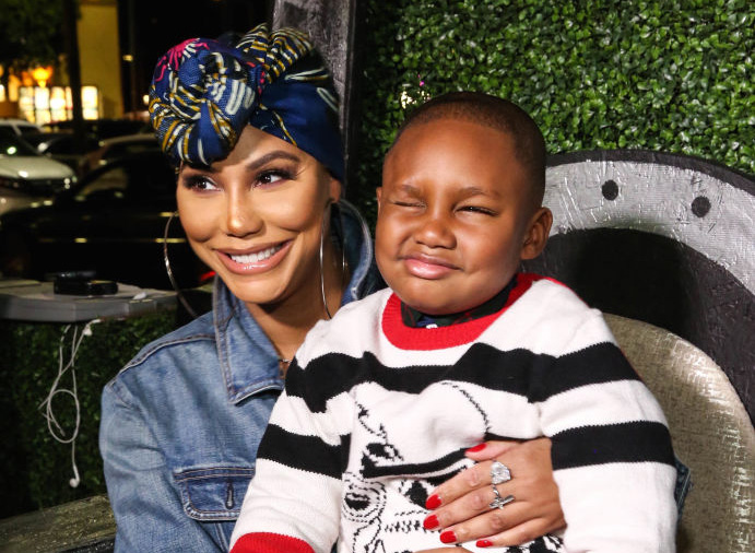 LOS ANGELES, CA - FEBRUARY 14: Tamar Braxton and son Logan Vincent Herbert attend the Pan African Film Festival red carpet and screening of Marvel Studios "Black Panther" at Cinemark Baldwin Hills Crenshaw 15 on February 14, 2018 in Los Angeles, California.