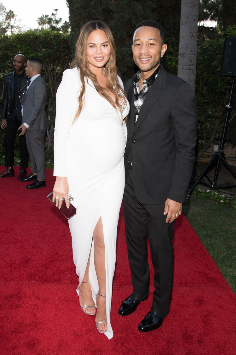 Chrissy Teigen and John Legend are both seen arriving to the Daily Front Row Awards held at the Beverly Hills Hotel