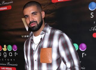 Drake, Virginia Black Whiskey and Sugar Factory American Brasserie debut the new 'Night Owl' goblet at the Fashion Show Mall in Las Vegas, Nevada.